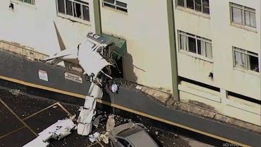 Avião cai sobre prédio residencial e deixa piloto inconsciente em Belo Horizonte