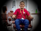 Fotografia de reportagem sobre José Pablo, o Barbeiro Mirim, e João Vitor, adolescentes mortos em Cachoeirinha, Pernambuco